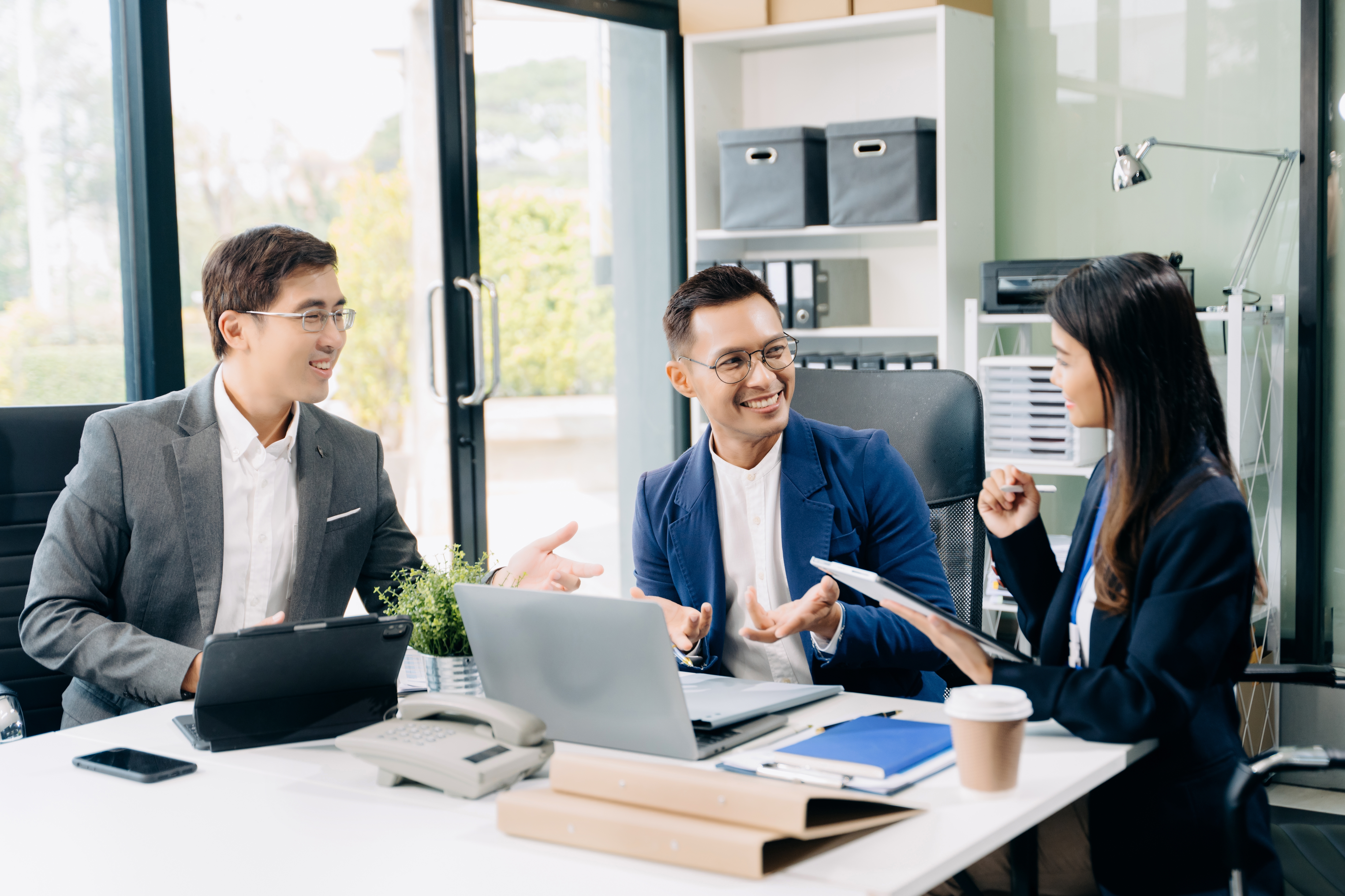 A group of people in a business meeting 