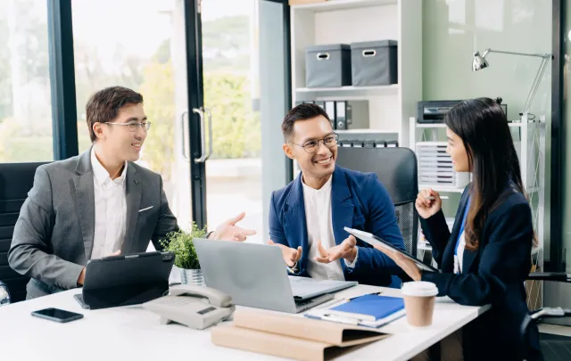 A group of people in a business meeting 